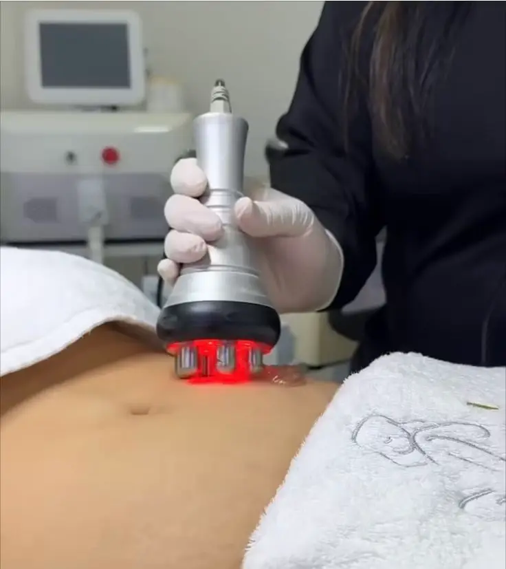 Person receiving advanced body contouring treatment.